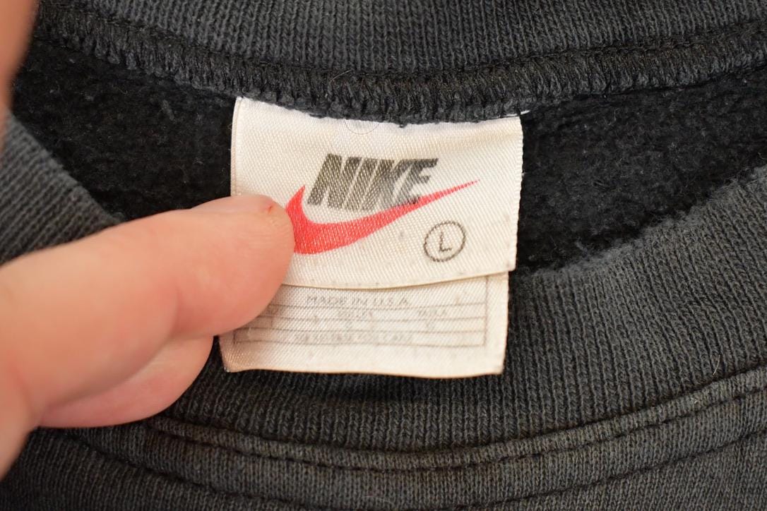 Vintage 1990s Nike Embroidered Mini Swoosh Sweatshirt Men's L from propervintagecanada