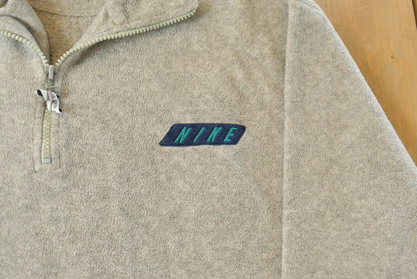 Vintage 1990s Nike Fleece Quarter Zip Sweater Men's XL from propervintagecanada