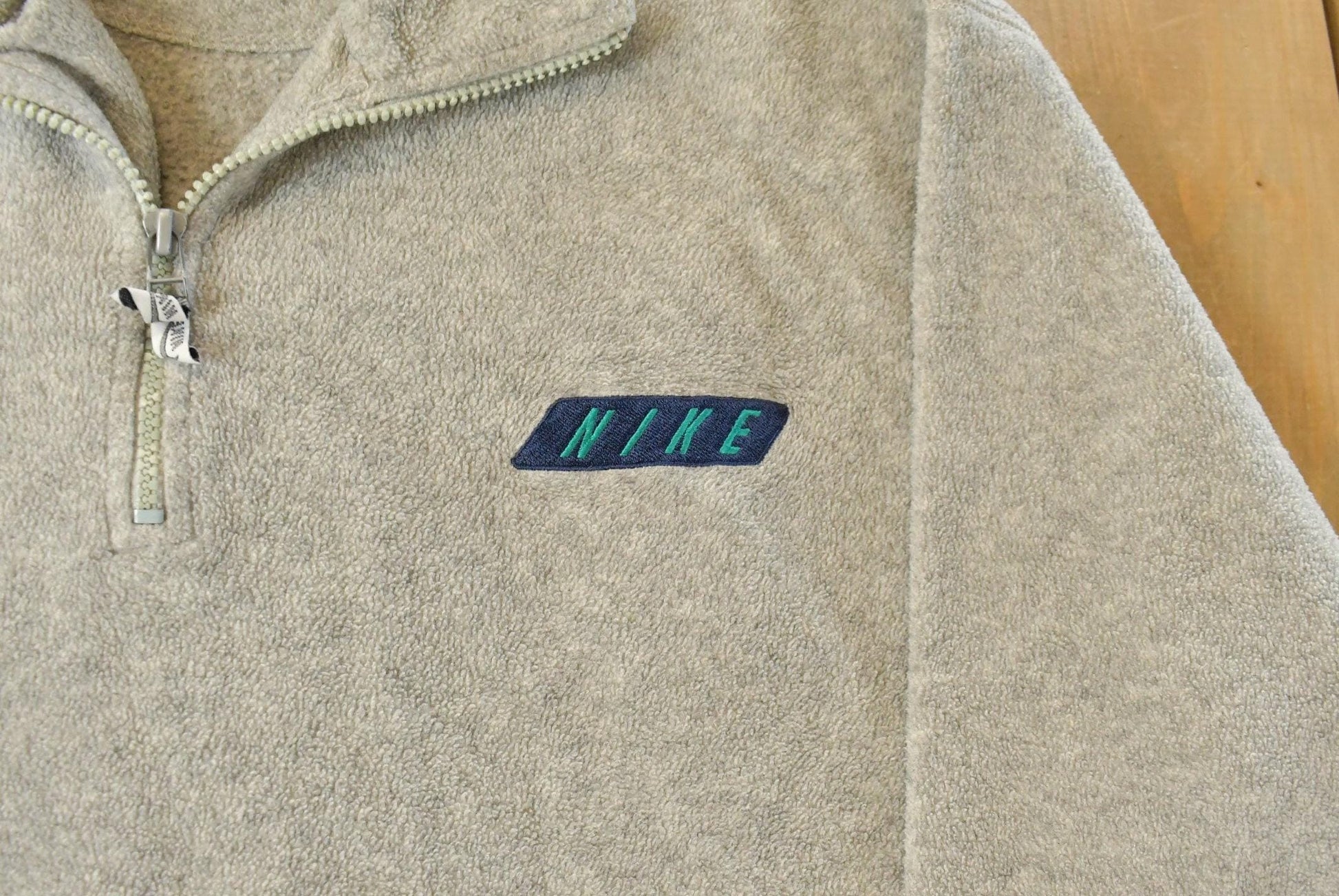 Vintage 1990s Nike Fleece Quarter Zip Sweater Men's XL from propervintagecanada