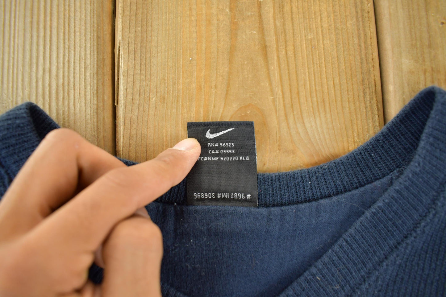 Vintage 1990s Nike Golf Knit V Neck Sweater Men's Large from propervintagecanada