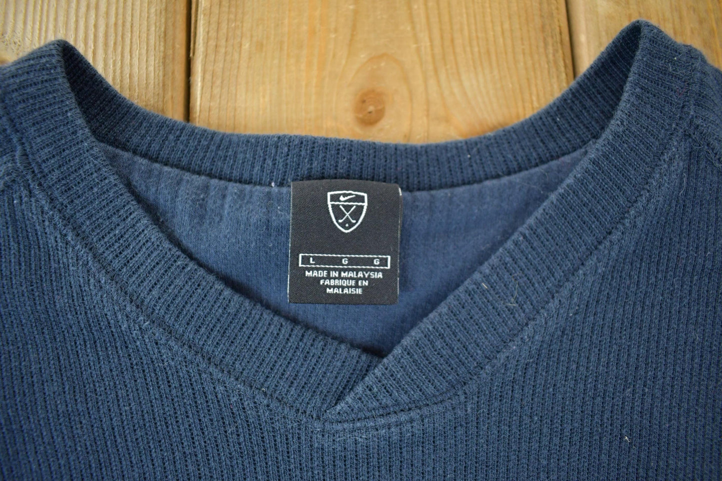 Vintage 1990s Nike Golf Knit V Neck Sweater Men's Large from propervintagecanada