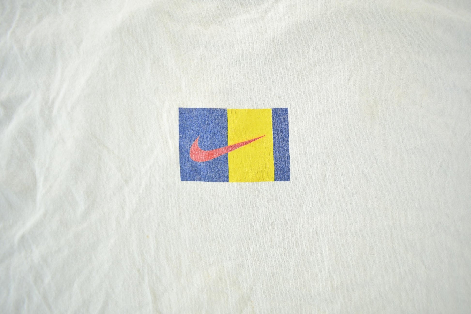 Vintage 1990s Nike Graphic T-Shirt Men's Large from propervintagecanada