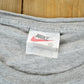 Vintage 1990s Nike Graphic T-Shirt Men's XL from propervintagecanada