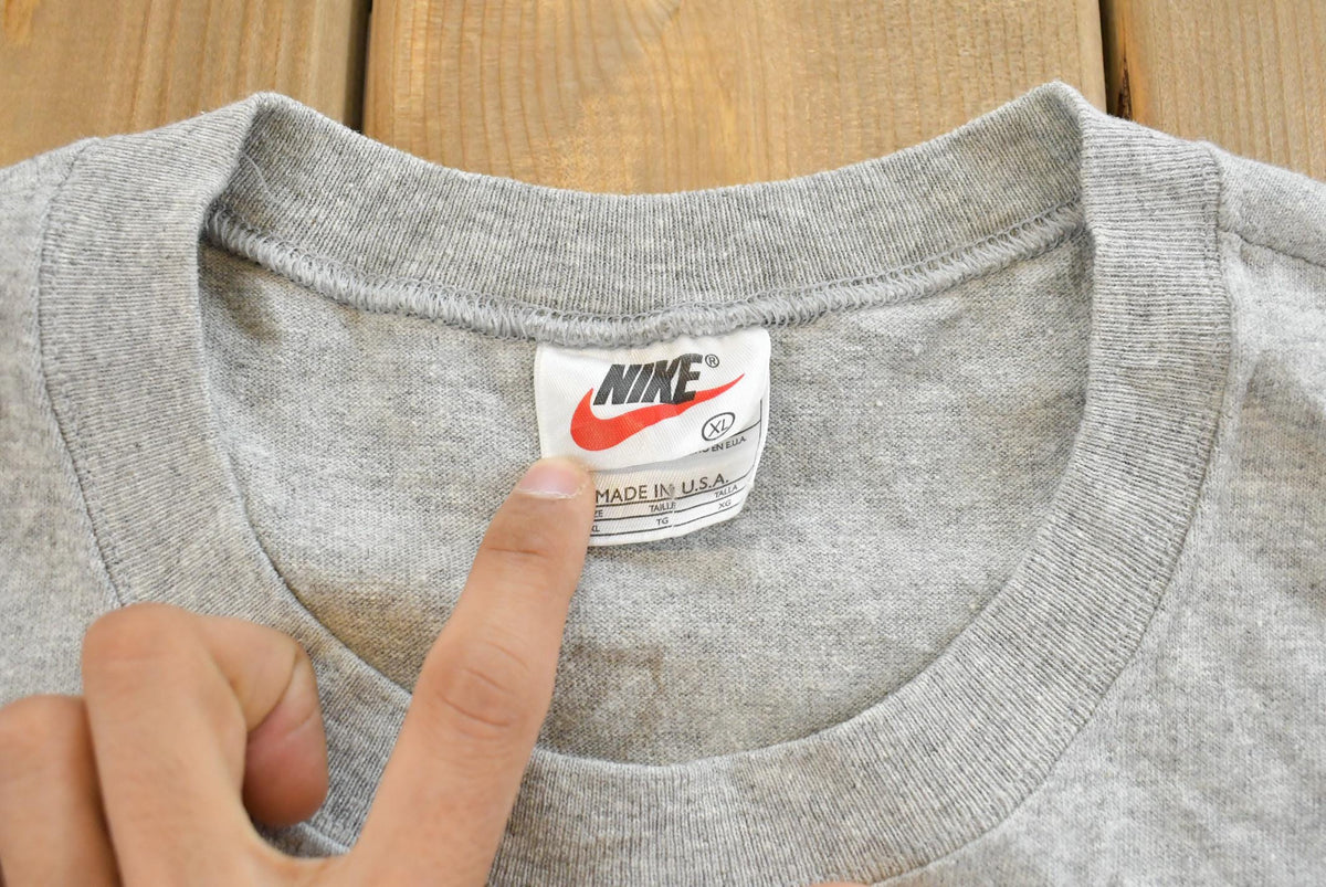 Vintage 1990s Nike Graphic Tank Top Shirt Made In USA Men's XL from propervintagecanada