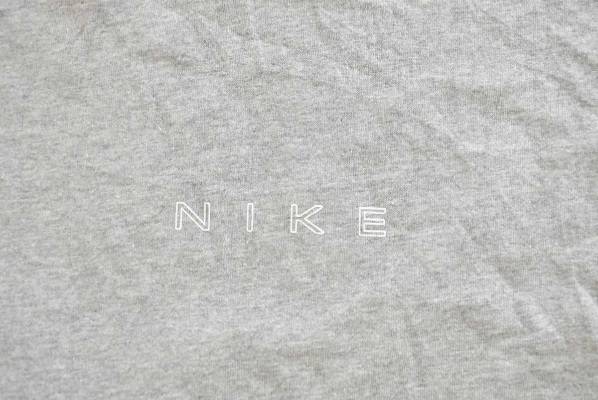 Vintage 1990s Nike Graphic Tank Top Shirt Made In USA Men's XL from propervintagecanada