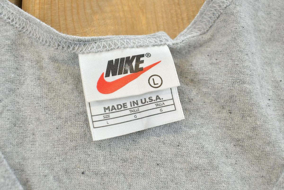 Vintage 1990s Nike Graphic Tank Top Shirt Mens L from propervintagecanada