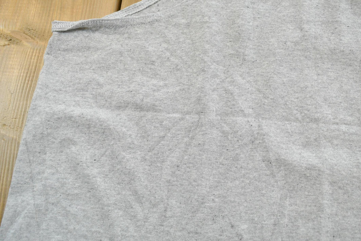 Vintage 1990s Nike Graphic Tank Top Shirt Mens L from propervintagecanada
