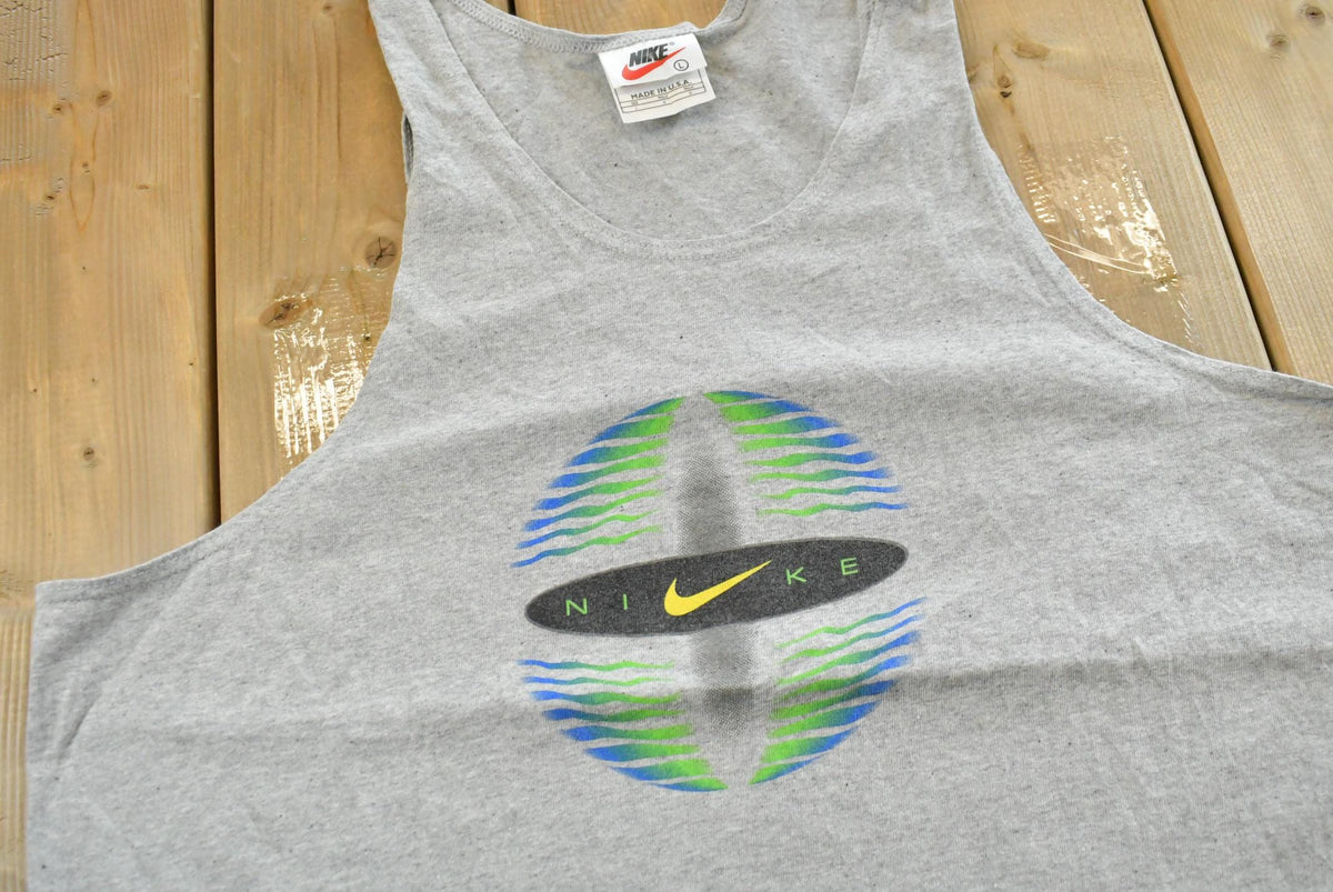 Vintage 1990s Nike Graphic Tank Top Shirt Mens L from propervintagecanada