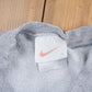 Vintage 1990s Nike Heather Grey Mini Swoosh Crewneck Sweatshirt Men's L from propervintagecanada