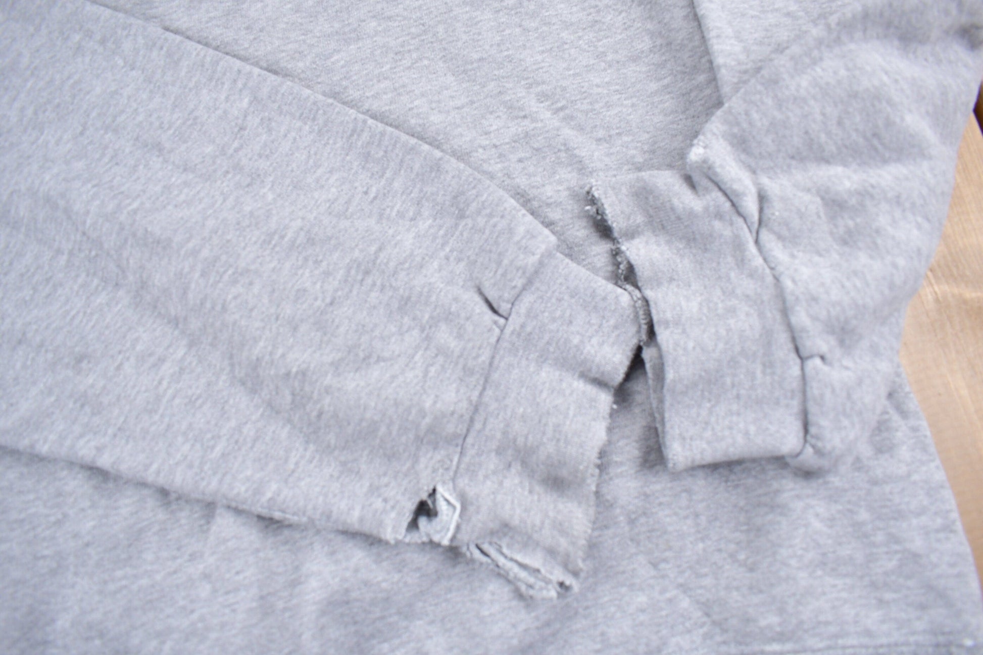Vintage 1990s Nike Heather Grey Mini Swoosh Crewneck Sweatshirt Men's L from propervintagecanada