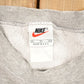 Vintage 1990s Nike Heather Grey Mini Swoosh Crewneck Sweatshirt Men's XL from propervintagecanada