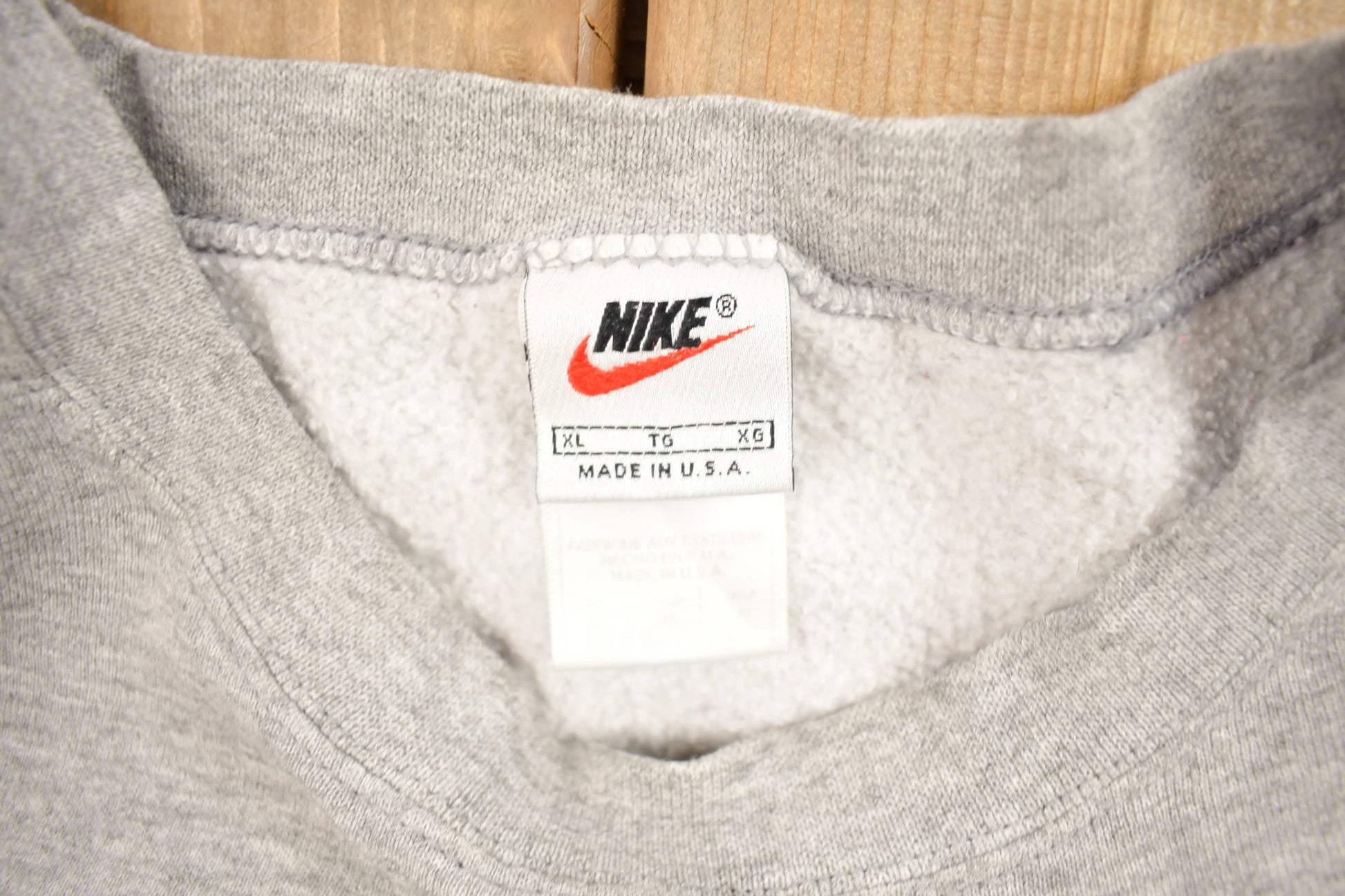 Vintage 1990s Nike Heather Grey Mini Swoosh Crewneck Sweatshirt Men's XL from propervintagecanada