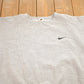 Vintage 1990s Nike Heather Grey Mini Swoosh Crewneck Sweatshirt Men's XL from propervintagecanada