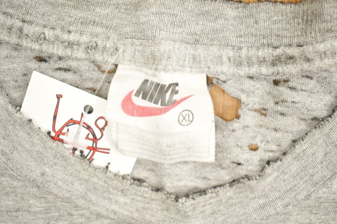Vintage 1990s Nike Logo Slogan Graphic T-Shirt Men's XL from propervintagecanada