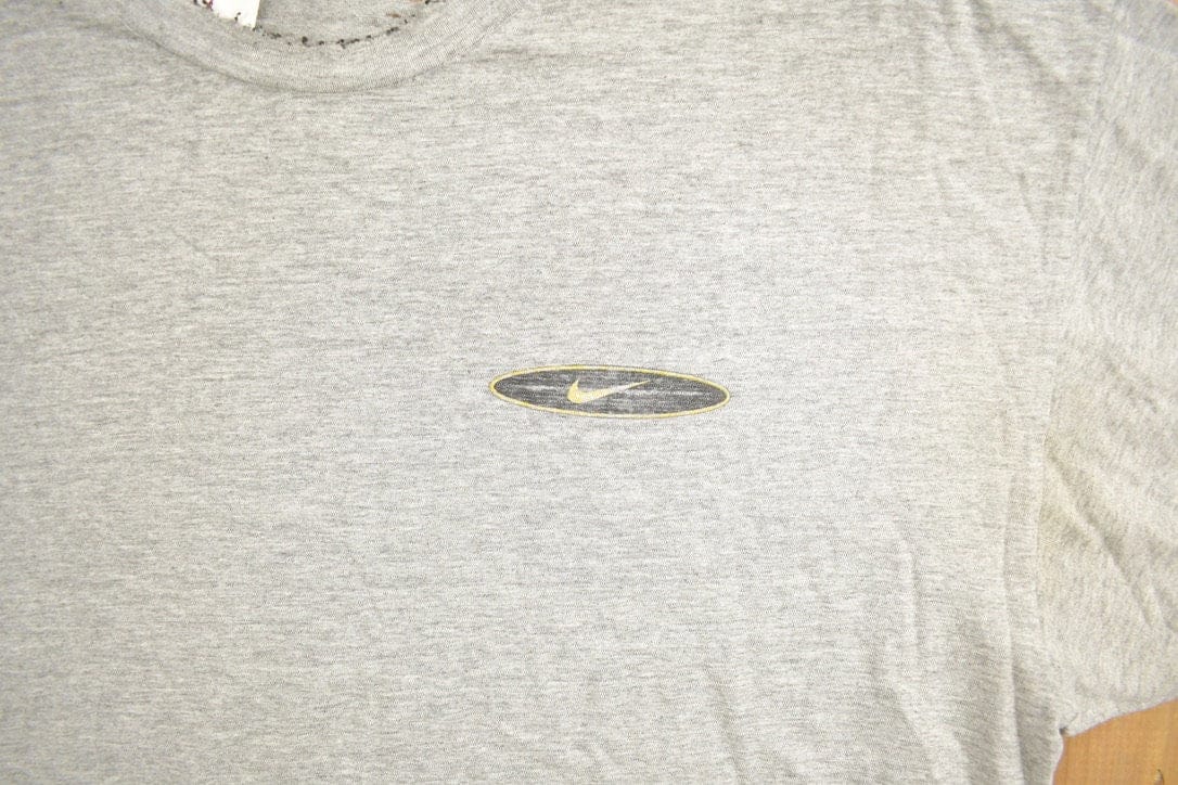 Vintage 1990s Nike Logo Slogan Graphic T-Shirt Men's XL from propervintagecanada