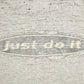Vintage 1990s Nike Logo Slogan Graphic T-Shirt Men's XL from propervintagecanada