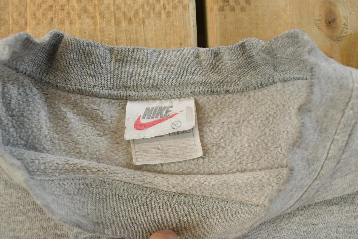 Vintage 1990s Nike Mini Swoosh Crewneck Sweatshirt Men's XL from propervintagecanada
