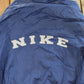 Vintage 1990s Nike Mini Swoosh Hooded Windbreaker Jacket Men's Large from propervintagecanada