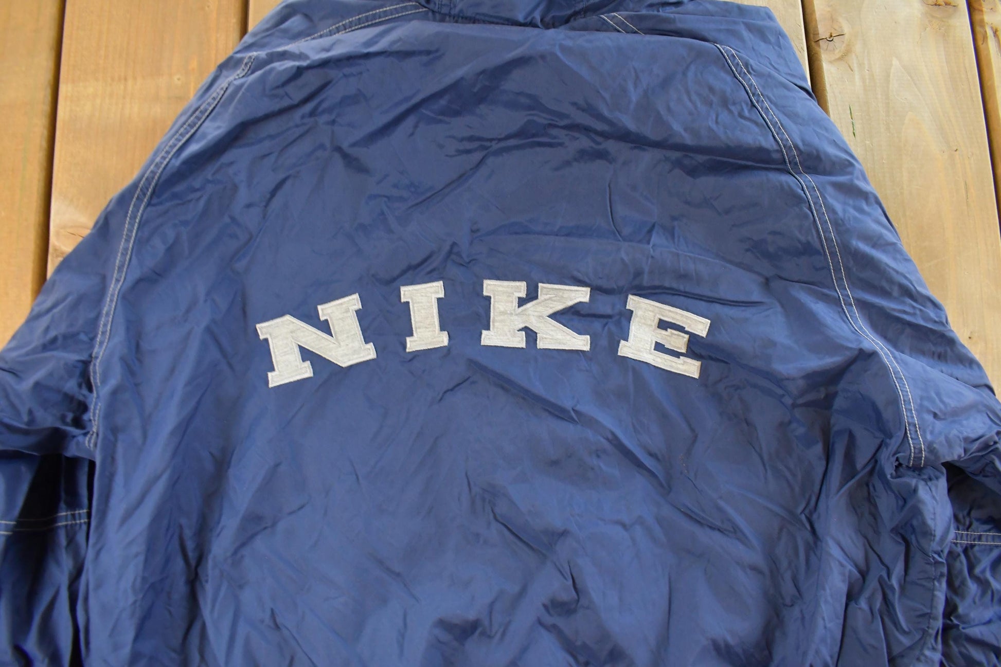 Vintage 1990s Nike Mini Swoosh Hooded Windbreaker Jacket Men's Large from propervintagecanada