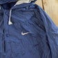 Vintage 1990s Nike Mini Swoosh Hooded Windbreaker Jacket Men's Large from propervintagecanada