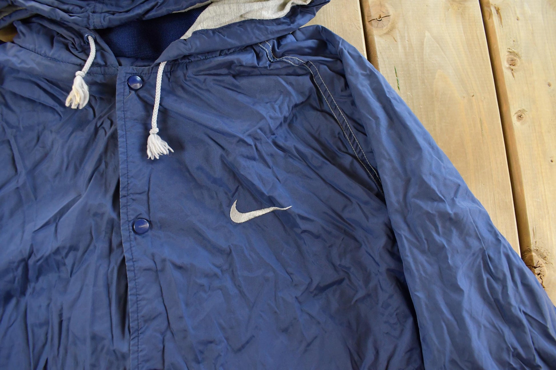 Vintage 1990s Nike Mini Swoosh Hooded Windbreaker Jacket Men's Large from propervintagecanada