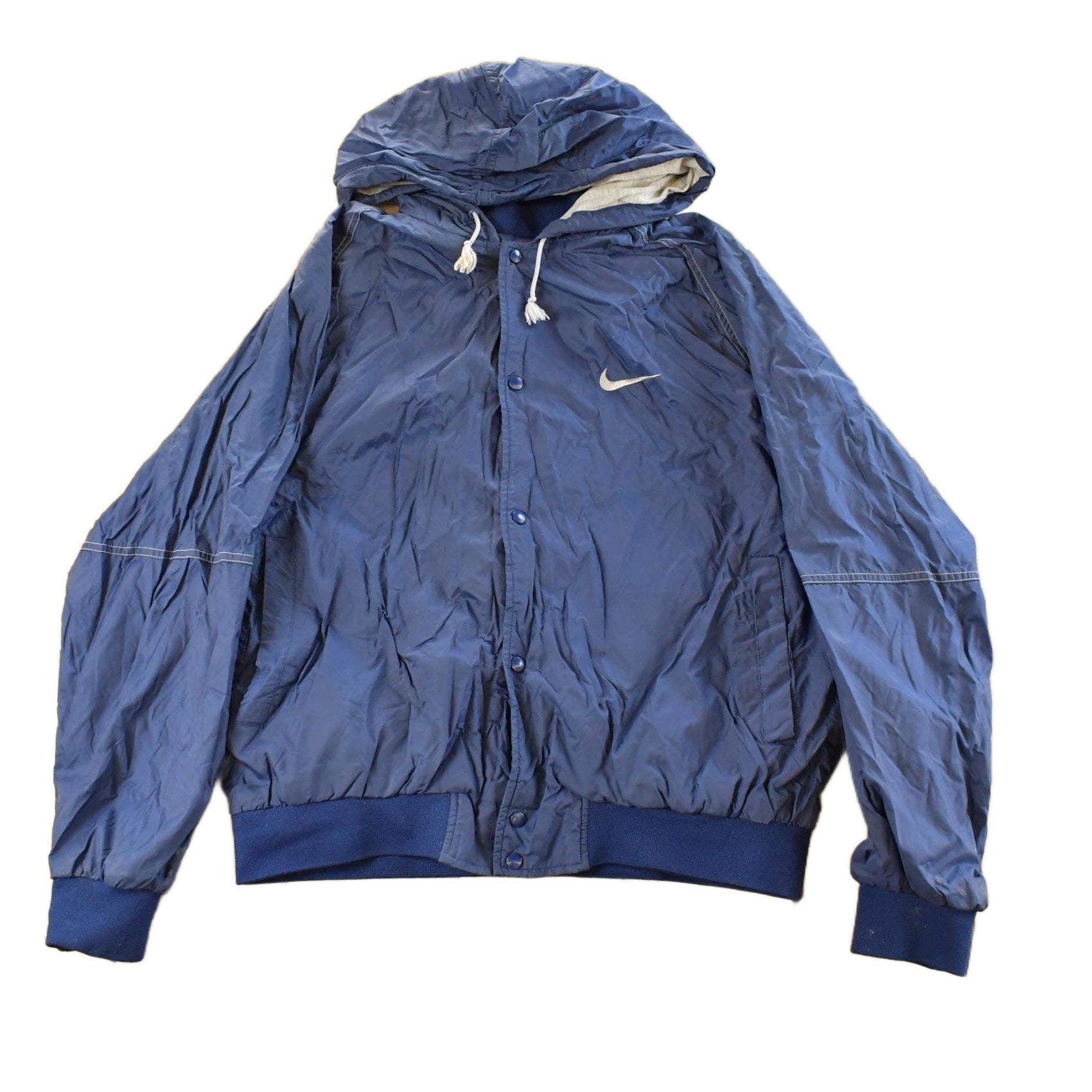 Vintage 1990s Nike Mini Swoosh Hooded Windbreaker Jacket Men's Large from propervintagecanada