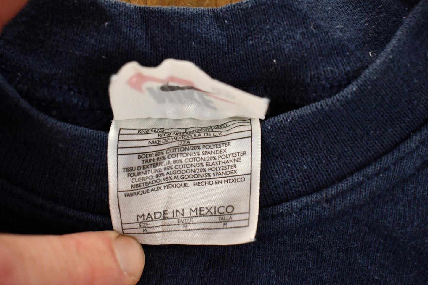 Vintage 1990s Nike Mini Swoosh Navy Crewneck Sweatshirt Men's M from propervintagecanada