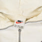 Vintage 1990s Nike Mini Swoosh Quarter Zip Hoodie Men's 2XL from propervintagecanada