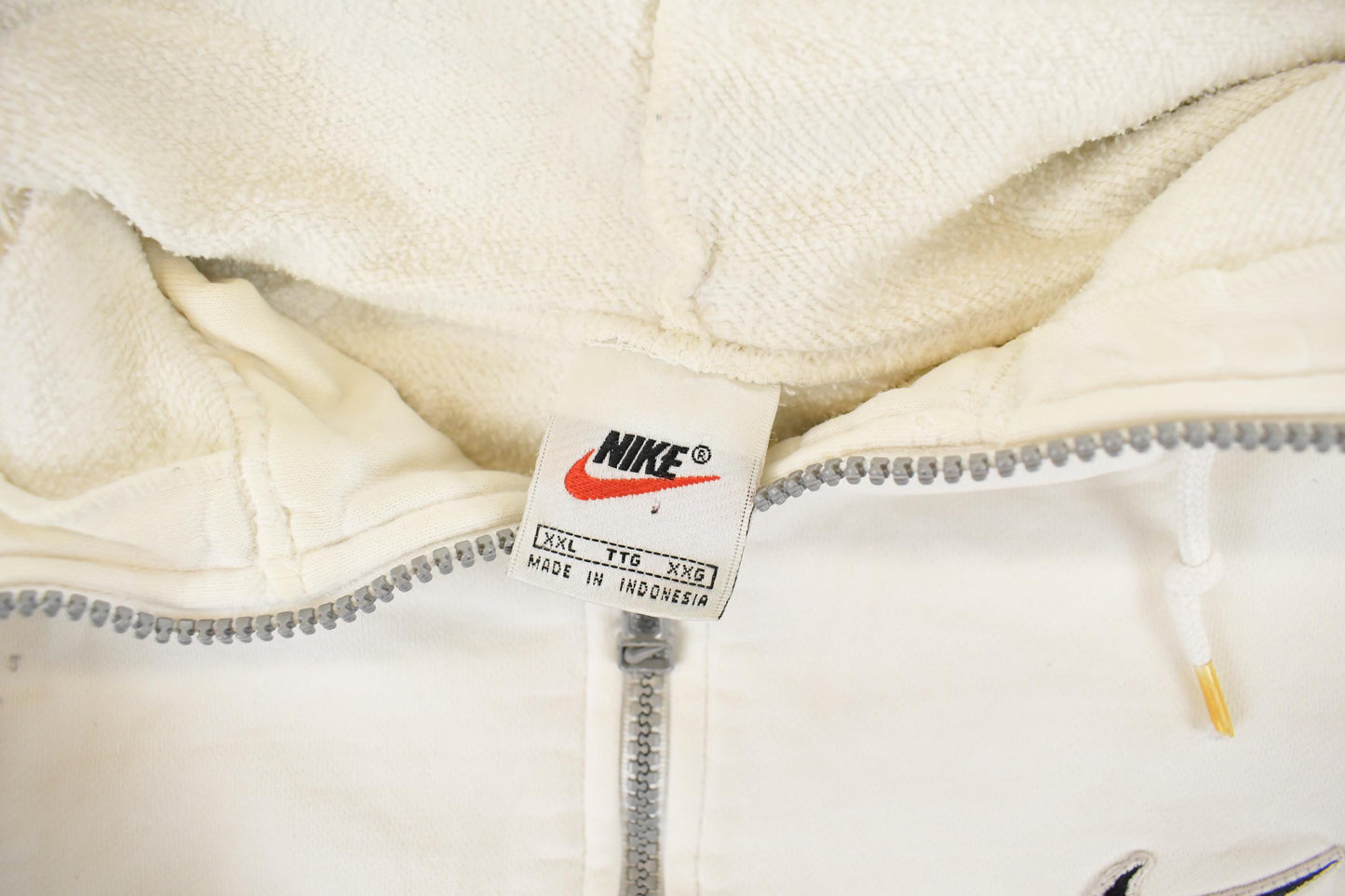 Vintage 1990s Nike Mini Swoosh Quarter Zip Hoodie Men's 2XL from propervintagecanada