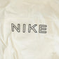 Vintage 1990s Nike Mini Swoosh Windbreaker Jacket Men's Large from propervintagecanada