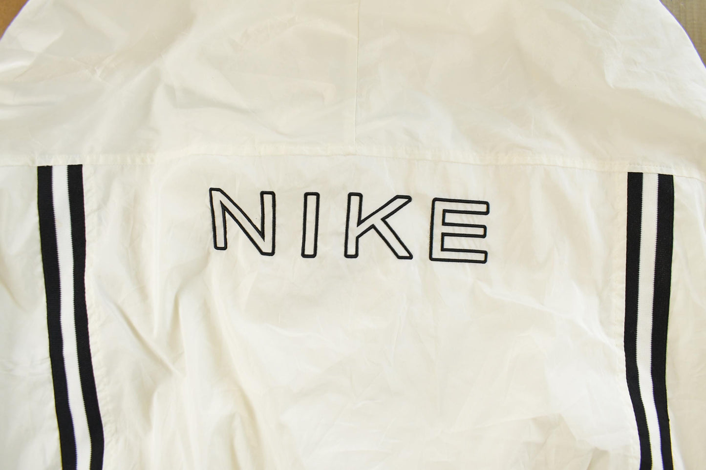 Vintage 1990s Nike Mini Swoosh Windbreaker Jacket Men's Large from propervintagecanada