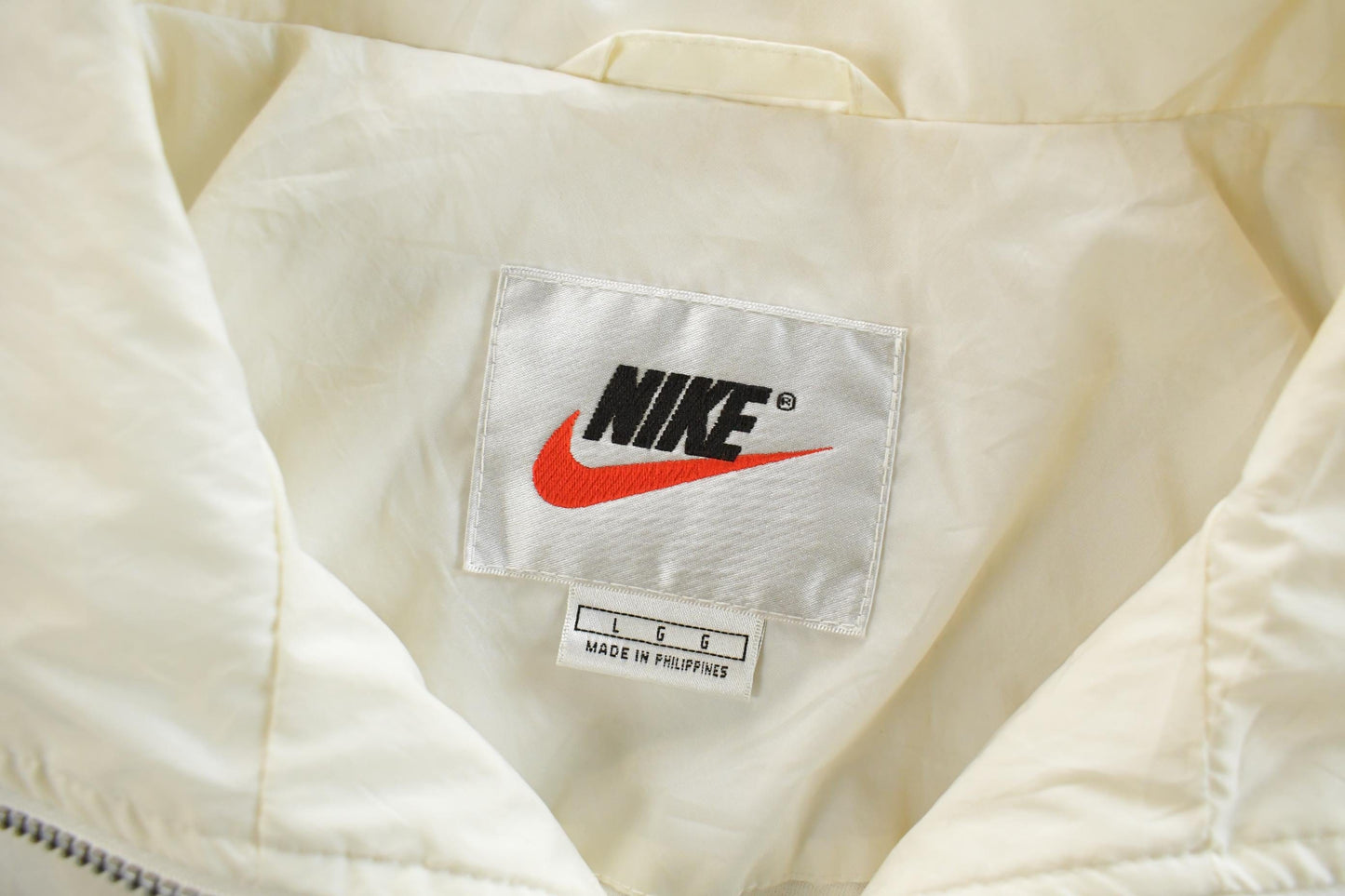Vintage 1990s Nike Mini Swoosh Windbreaker Jacket Men's Large from propervintagecanada
