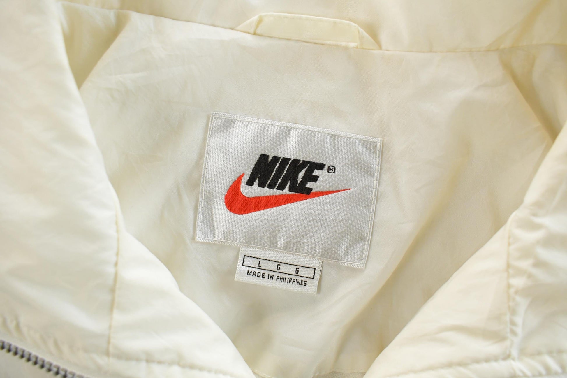 Vintage 1990s Nike Mini Swoosh Windbreaker Jacket Men's Large from propervintagecanada