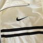 Vintage 1990s Nike Mini Swoosh Windbreaker Jacket Men's Large from propervintagecanada