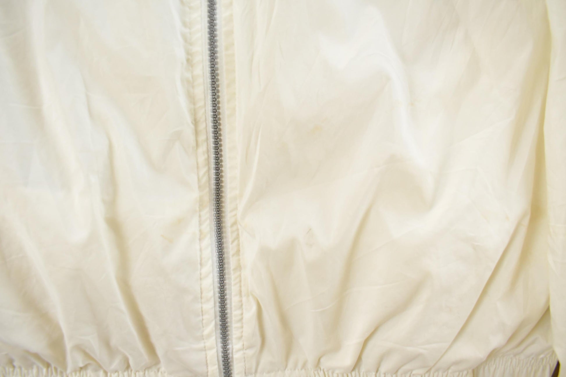 Vintage 1990s Nike Mini Swoosh Windbreaker Jacket Men's Large from propervintagecanada