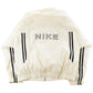 Vintage 1990s Nike Mini Swoosh Windbreaker Jacket Men's Large from propervintagecanada