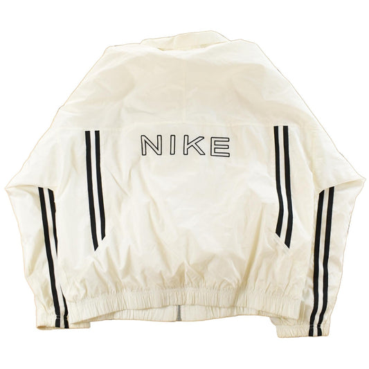 Vintage 1990s Nike Mini Swoosh Windbreaker Jacket Men's Large from propervintagecanada