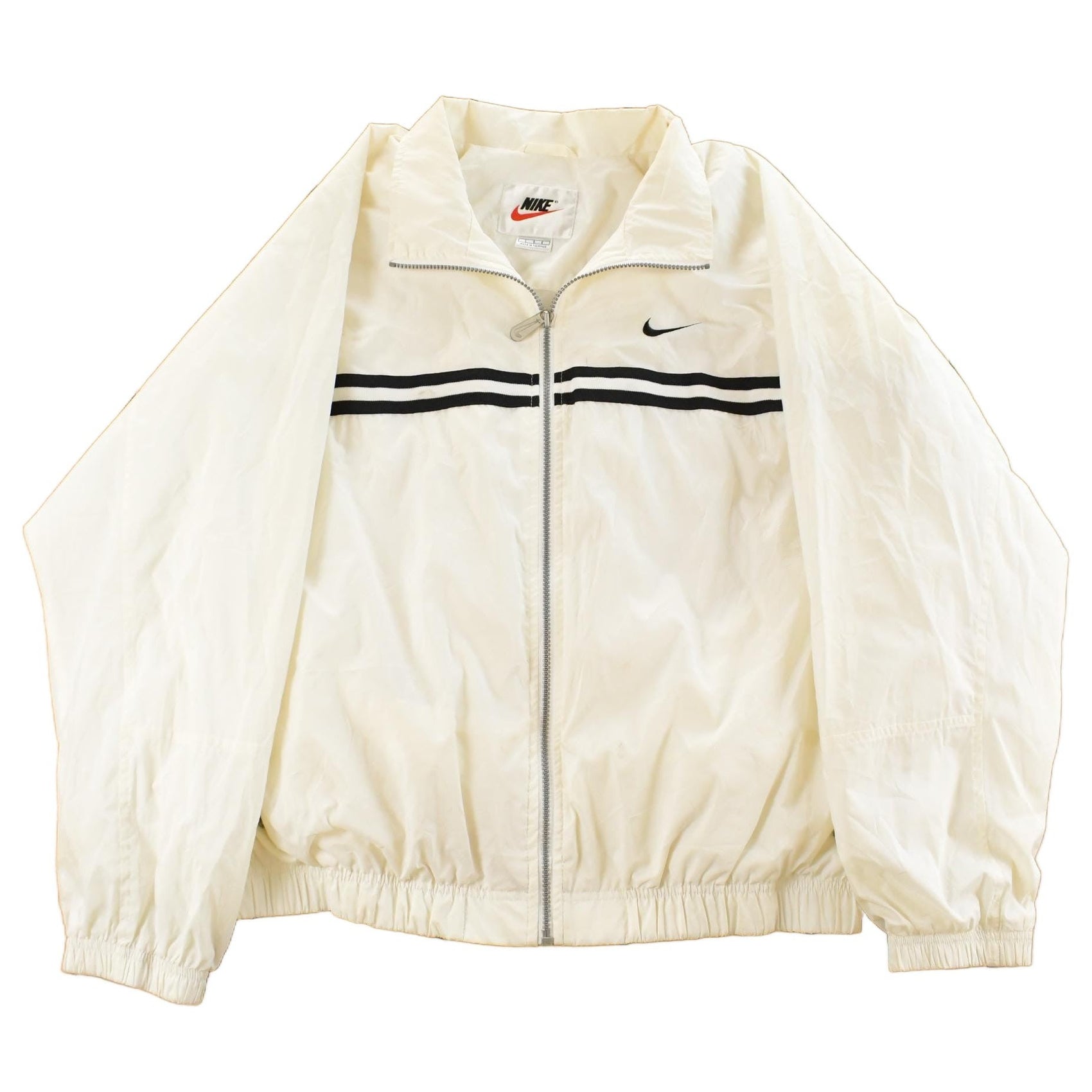 Vintage 1990s Nike Mini Swoosh Windbreaker Jacket Men's Large from propervintagecanada