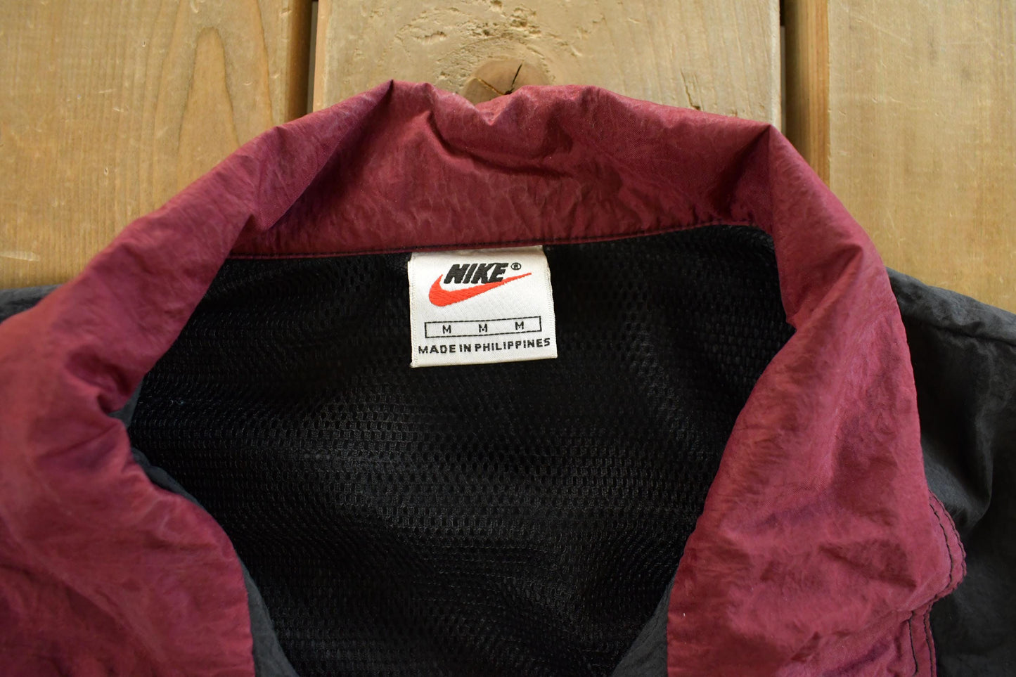 Vintage 1990s Nike Mini Swoosh Windbreaker Jacket Men's Medium from propervintagecanada