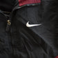 Vintage 1990s Nike Mini Swoosh Windbreaker Jacket Men's Medium from propervintagecanada