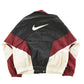 Vintage 1990s Nike Mini Swoosh Windbreaker Jacket Men's Medium from propervintagecanada