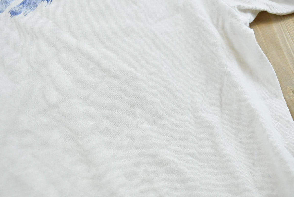Vintage 1990s Nike Swoosh Graphic T-Shirt Men's L from propervintagecanada