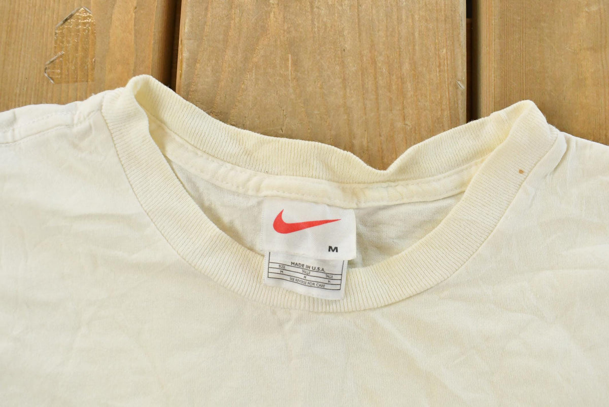 Vintage 1990s Nike Swoosh Swoosh T-Shirt Women's M from propervintagecanada