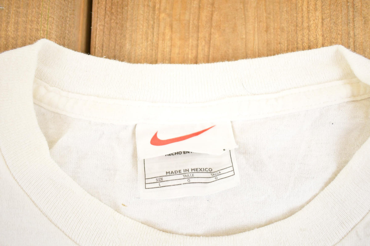 Vintage 1990s Nike T-Shirt Men's L from propervintagecanada