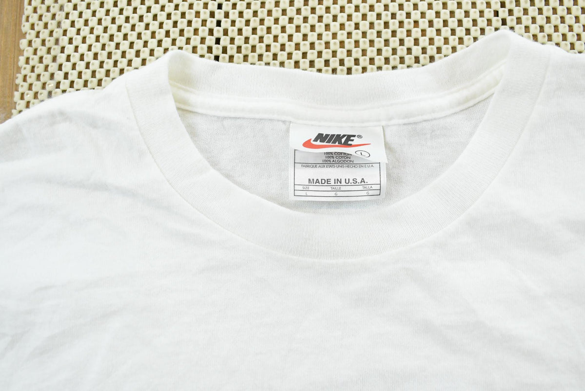 Vintage 1990s Nike Town Seattle T-Shirt Mens L from propervintagecanada