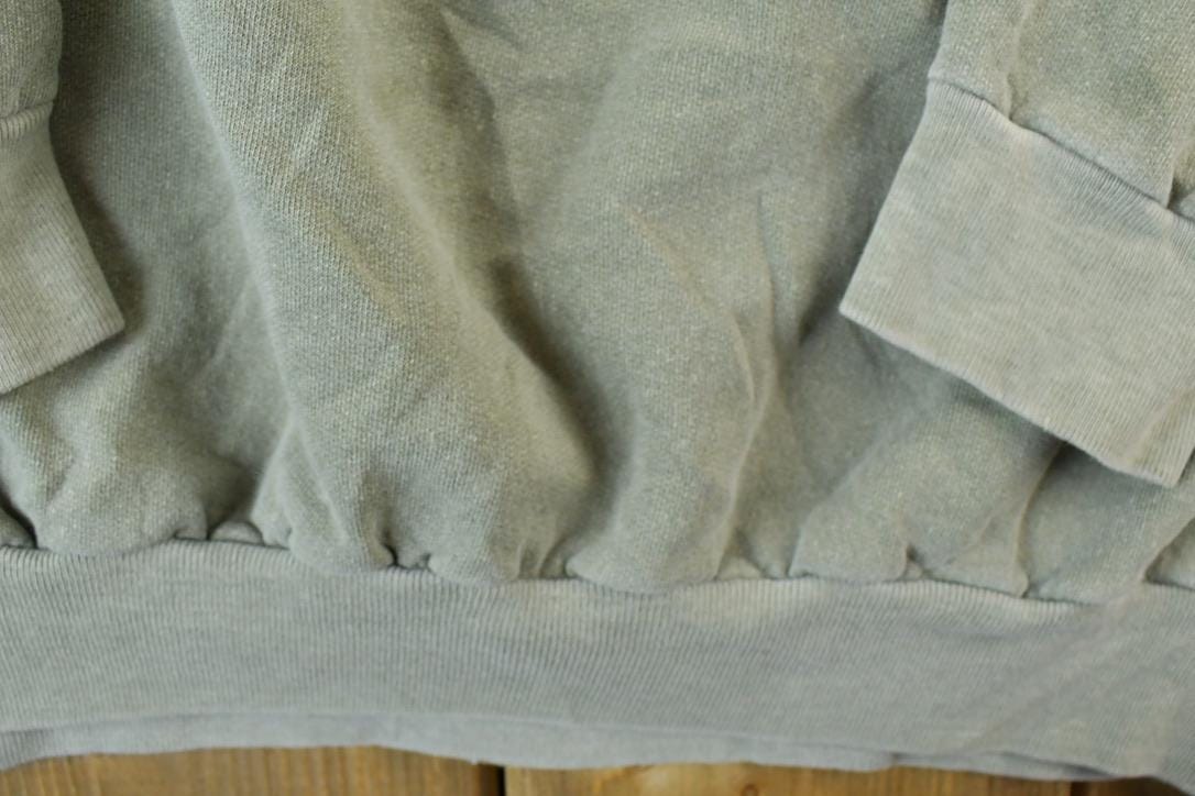 Vintage 1990s Norman wells Rock Guy Souvenir Crewneck Sweatshirt Men's Large from propervintagecanada