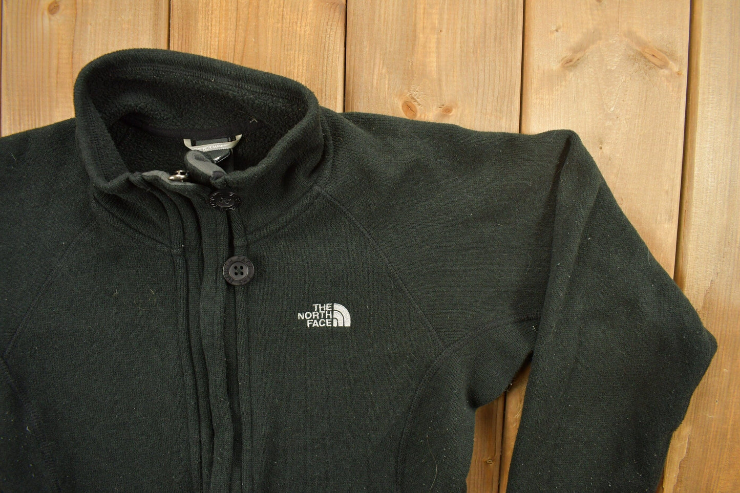 Vintage 1990s North Face Button Fleece Zip Up Sweater Women's XS from propervintagecanada
