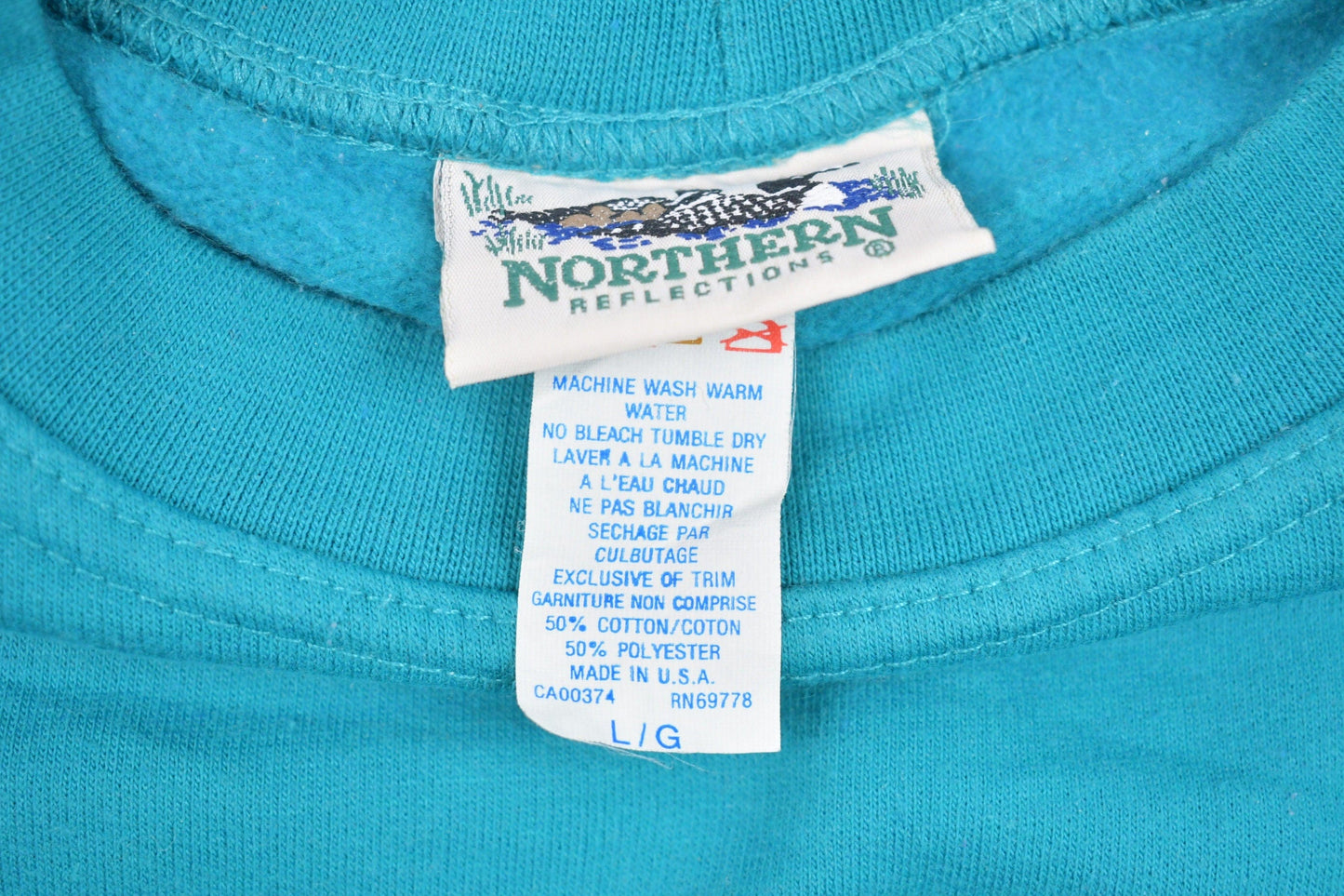 Vintage 1990s North Reflections Crewneck Sweatshirt Men's Large from propervintagecanada