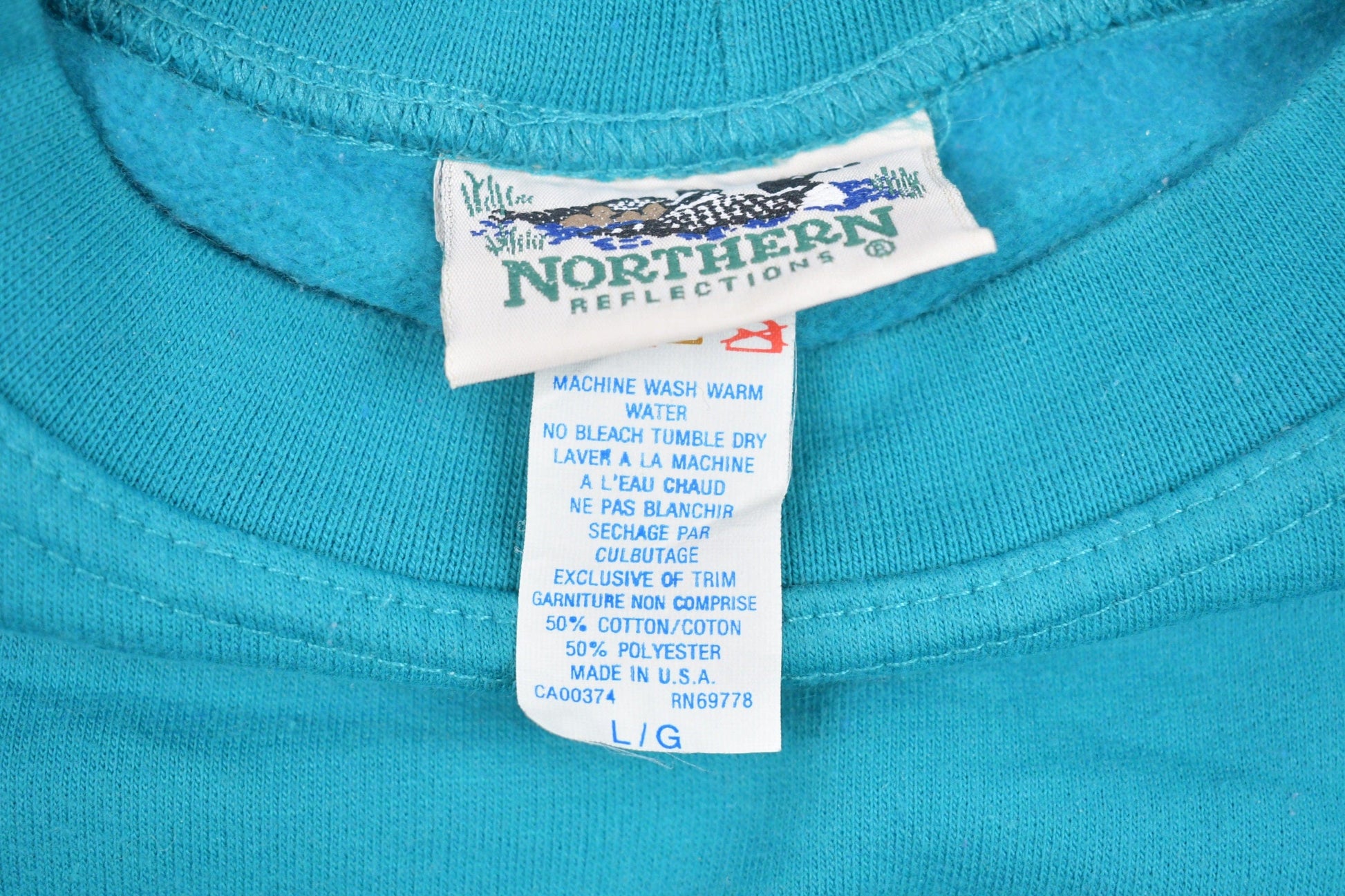 Vintage 1990s North Reflections Crewneck Sweatshirt Men's Large from propervintagecanada
