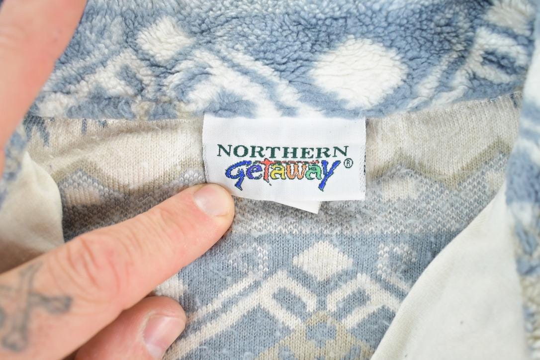 Vintage 1990s Northern Getaway Fleece AOP Outdoorsman Snowflake Sweater Men's Small from propervintagecanada